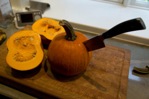 Three pie pumpkins await their fate. The knife is admittedly gratuitous.